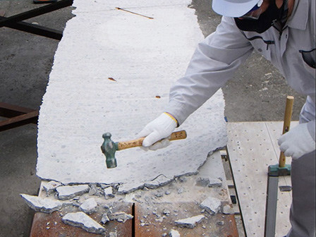Figure 5: Removal of concrete debris on the girder